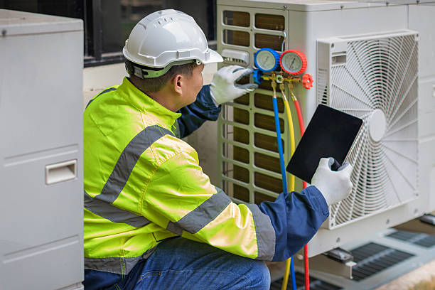 Professional Hvac technician working in Farmingville, NY